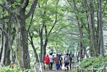 Cool Highlands of Manhangjae Hill Offer Respite from Scorching Summer Heat