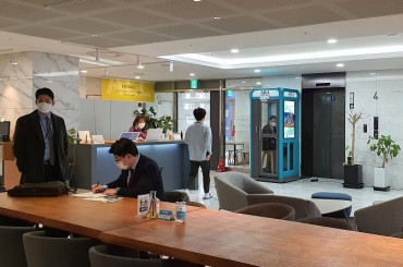 Public Phone Booth Upcycled into One-person Workplace